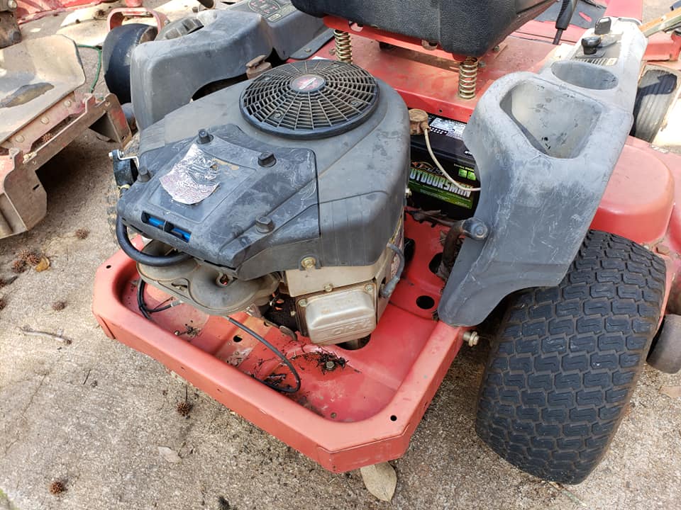Close-up of a mower engine and deck